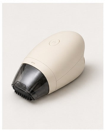 Crumb Mini Vacuum on a clean neutral background