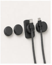 Magnetic Cable Docks on a clean neutral background