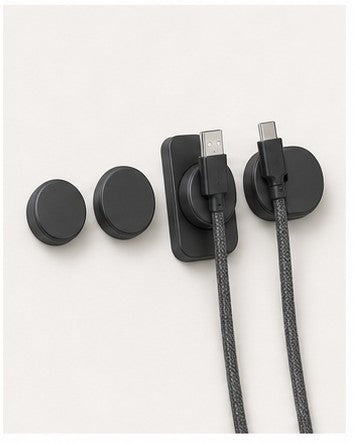 Magnetic Cable Docks on a clean neutral background