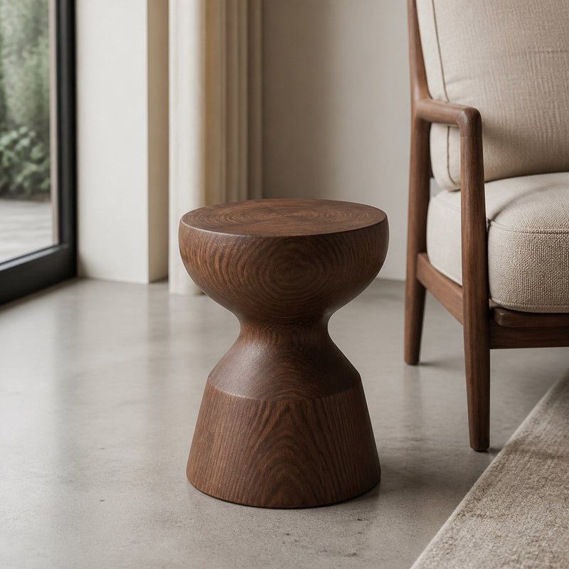 Sculpted Wood Side Stool in a warm modern interior