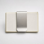 Solid Stainless Money Clip on a clean neutral background