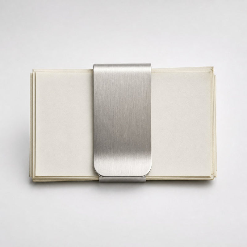 Solid Stainless Money Clip on a clean neutral background