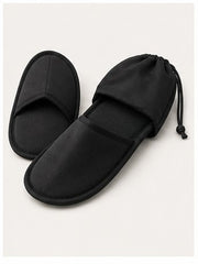 FoldAway Travel Slippers on a clean neutral background
